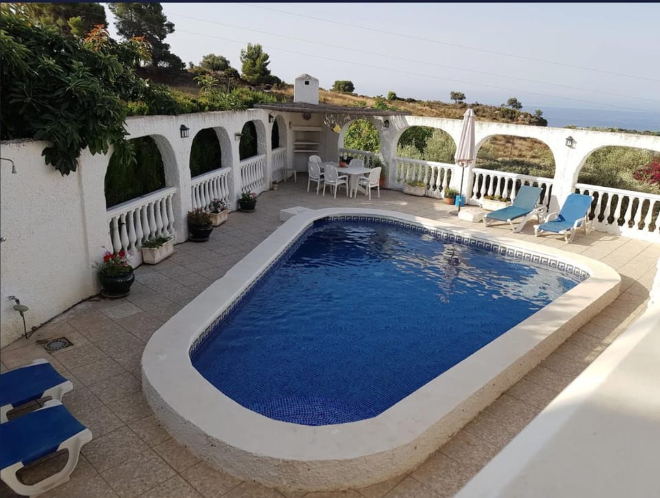 Property building, Living room, Swimming pool