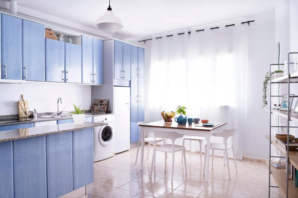 Kitchen or kitchenette, Dining area, oven, stove, washing machine