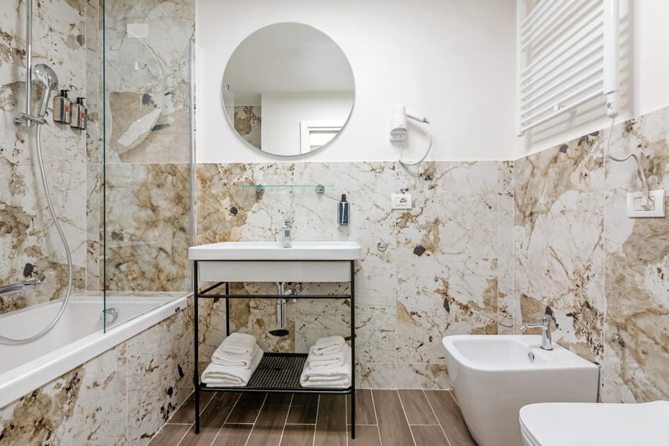 Bathroom, Bath, bidet, hair dryier, towels