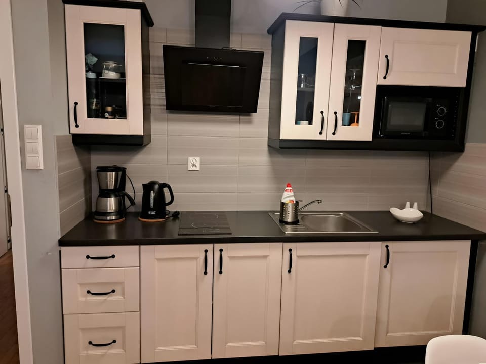 Kitchen or kitchenette, microwave