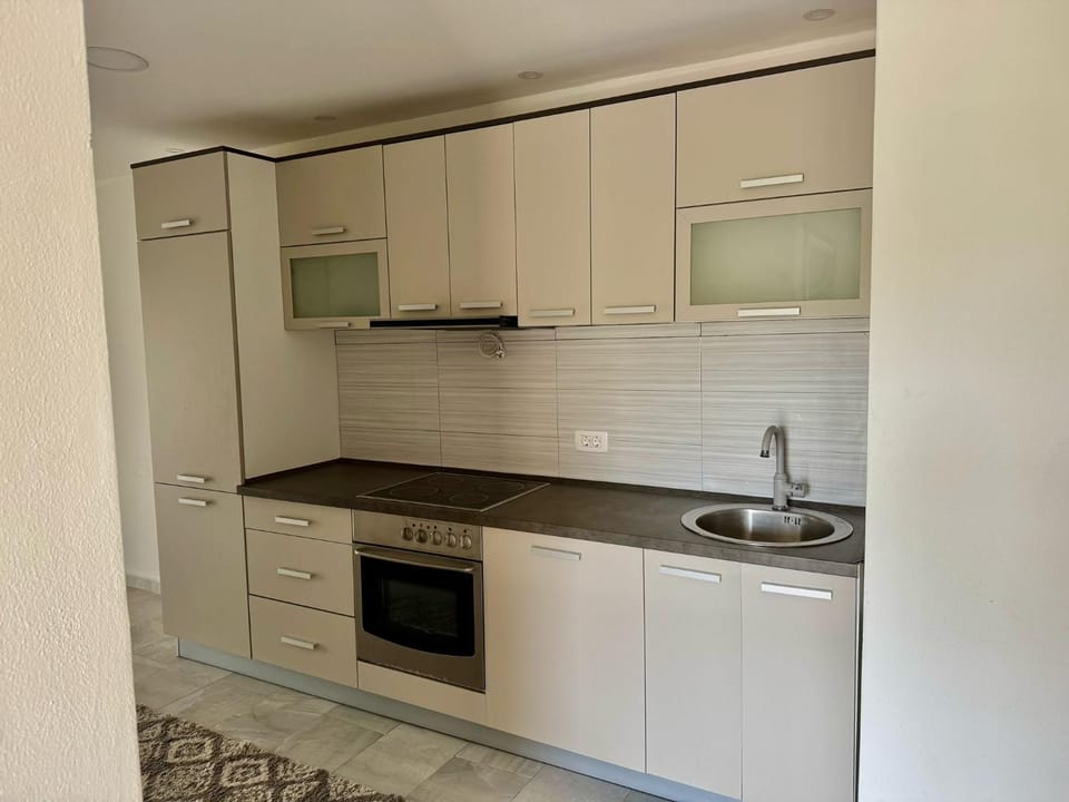 Kitchen or kitchenette, oven, stove