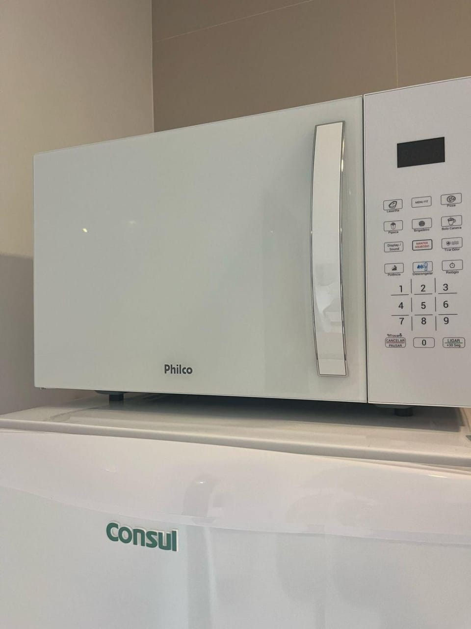 Kitchen or kitchenette, microwave