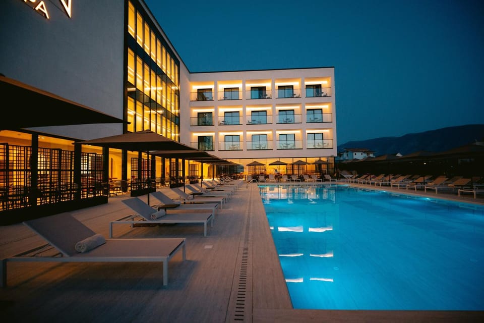 Property building, Night, Pool view, Swimming pool, Swimming pool, sunbed
