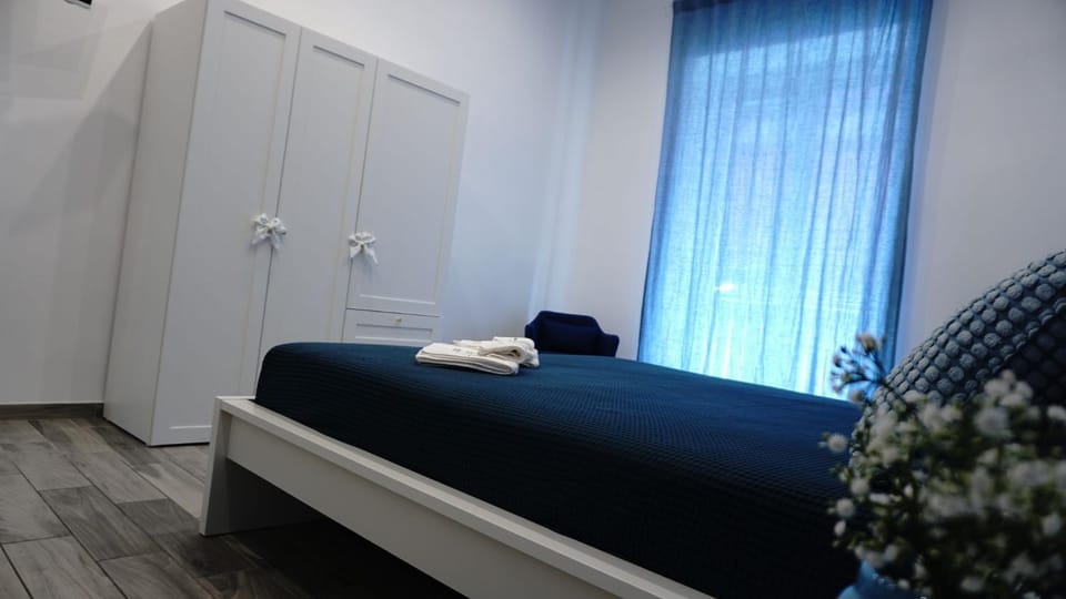 Bed, Photo of the whole room, Bedroom, towels, wardrobe