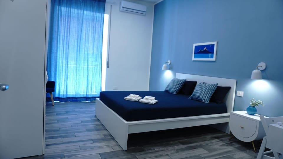 Bed, Photo of the whole room, Bedroom, towels, air conditioner
