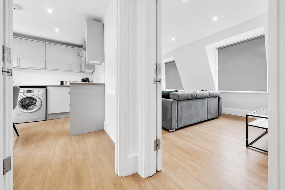 Facade/entrance, Kitchen or kitchenette, dishwasher, stove, washing machine, dryer