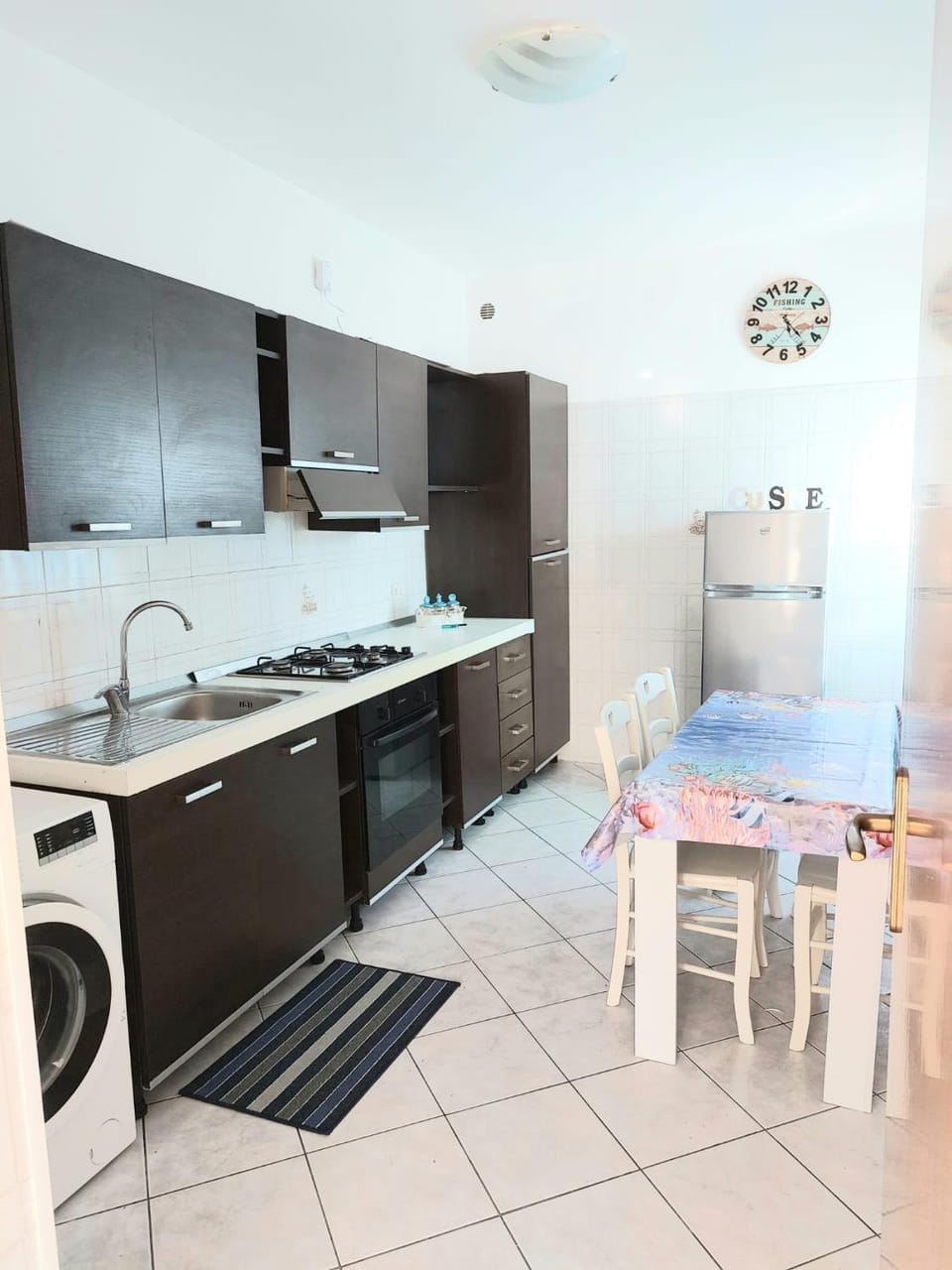 Kitchen or kitchenette, Dining area, oven, stove, washing machine