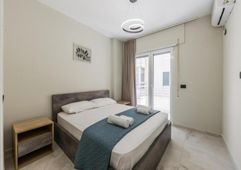Bed, Photo of the whole room, Bedroom, towels, air conditioner