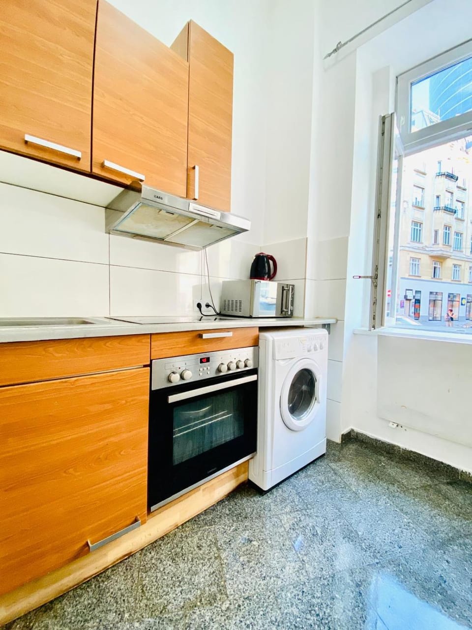 Kitchen or kitchenette, washing machine