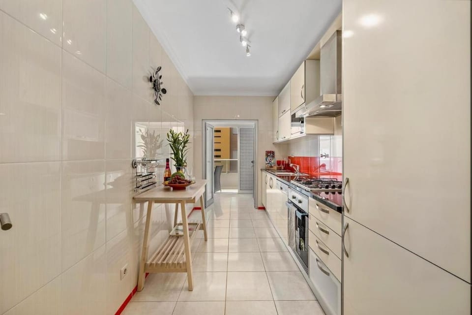 Kitchen or kitchenette, dishwasher, oven, stove