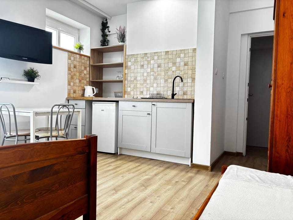Kitchen or kitchenette, stove