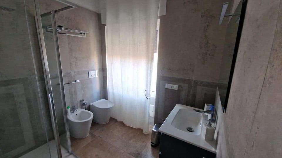 Shower, Toilet, Bathroom, bidet, hair dryier, towels