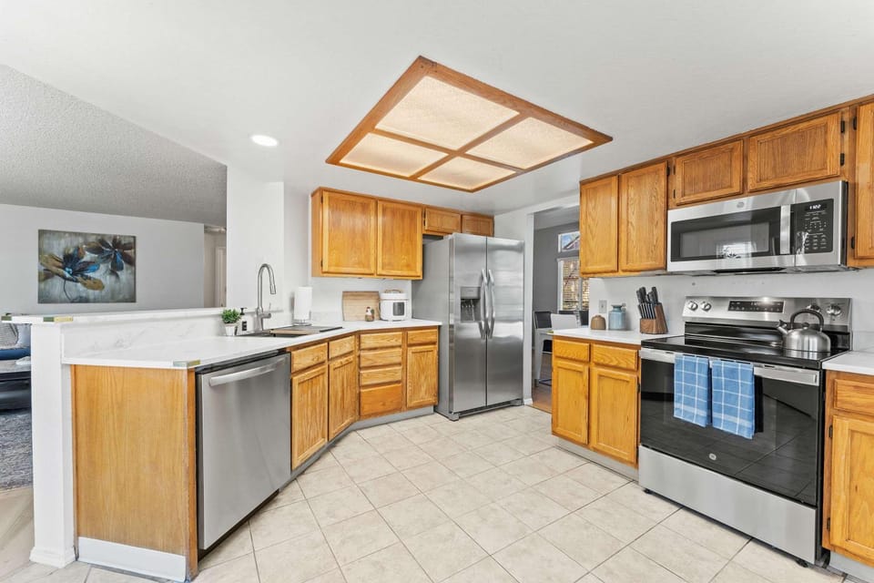Kitchen or kitchenette, dishwasher, oven, stove, toaster