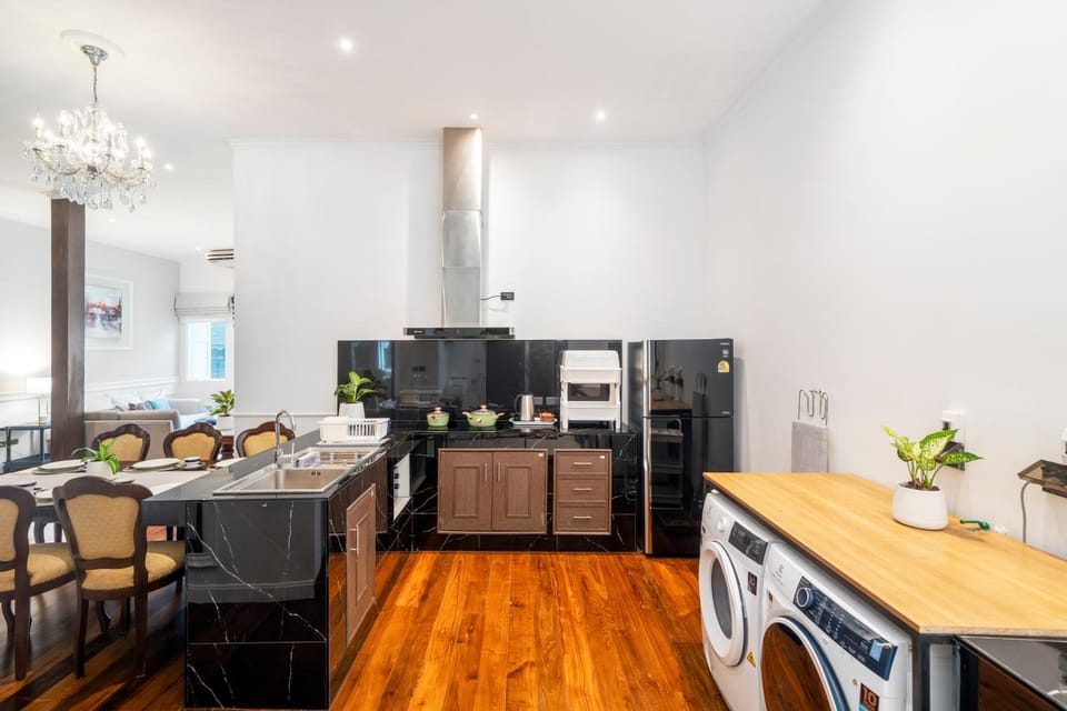 Kitchen or kitchenette, Dining area, stove, washing machine, dryer