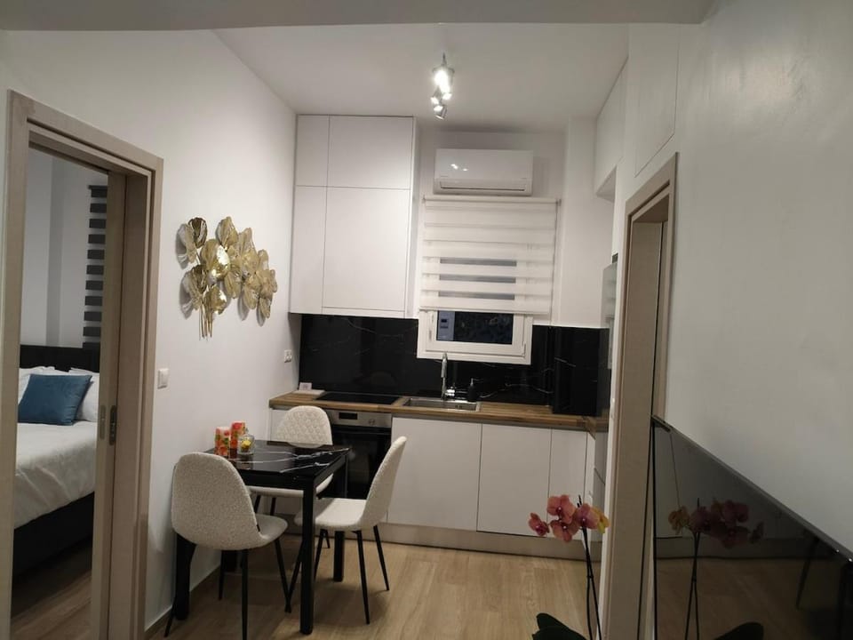 Cozy 1-Bedroom Flat in the Heart of Athens by ΜΡS Apartment in Athens