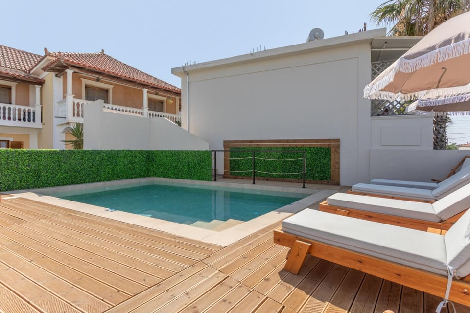 Property building, Living room, Swimming pool