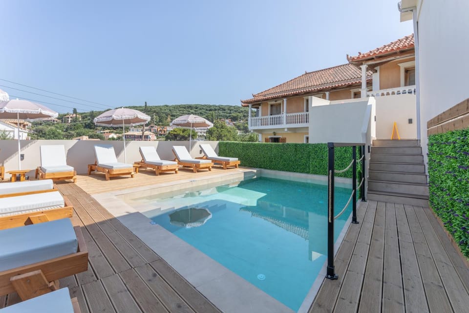 Property building, Living room, Swimming pool