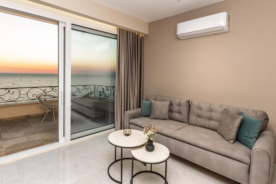 View (from property/room), Living room, Seating area, Sea view