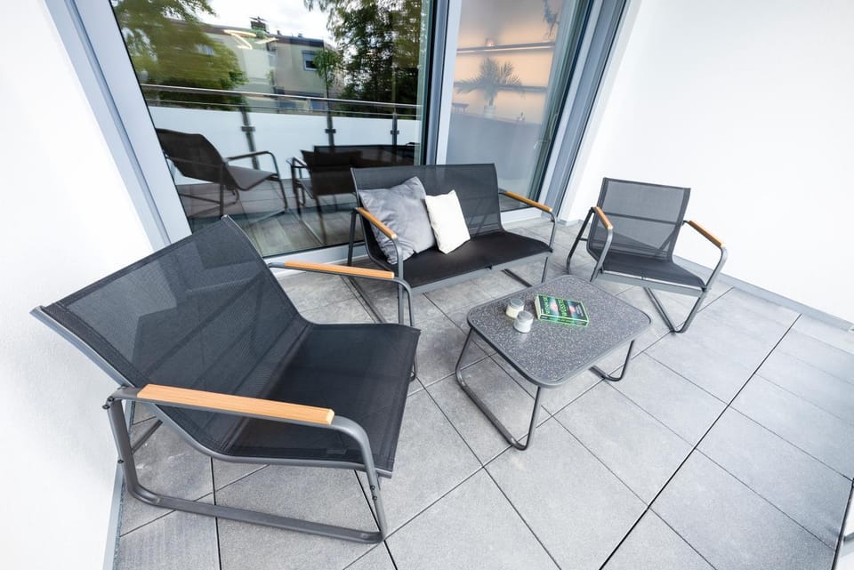 Balcony/Terrace, Seating area, Street view, Sunset