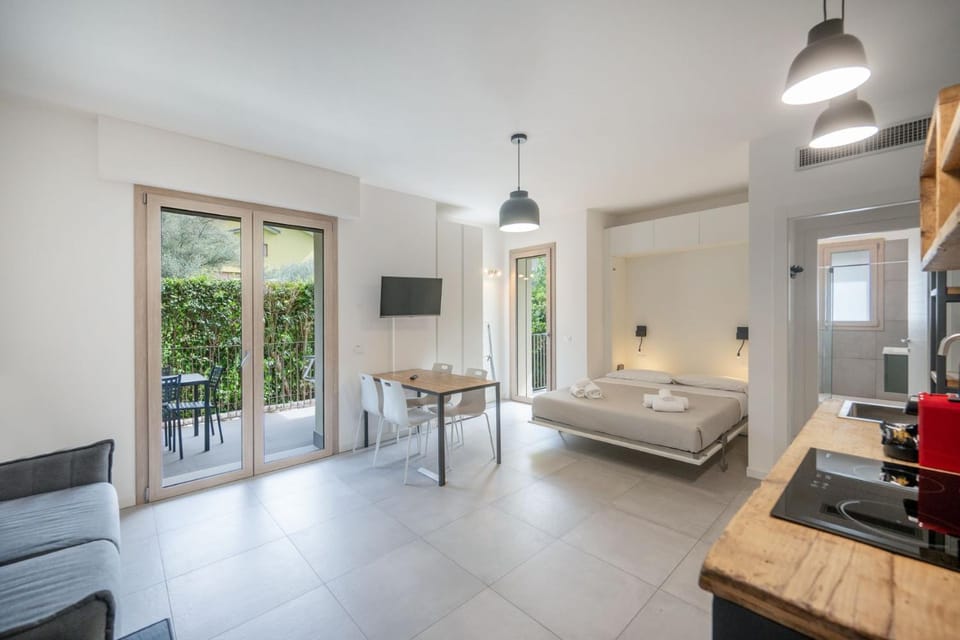 Bed, Kitchen or kitchenette, Living room, Seating area