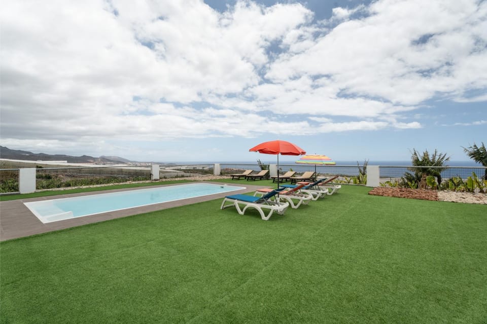 Property building, Living room, Swimming pool