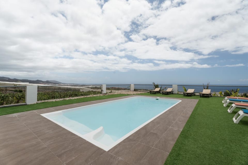 Property building, Living room, Swimming pool