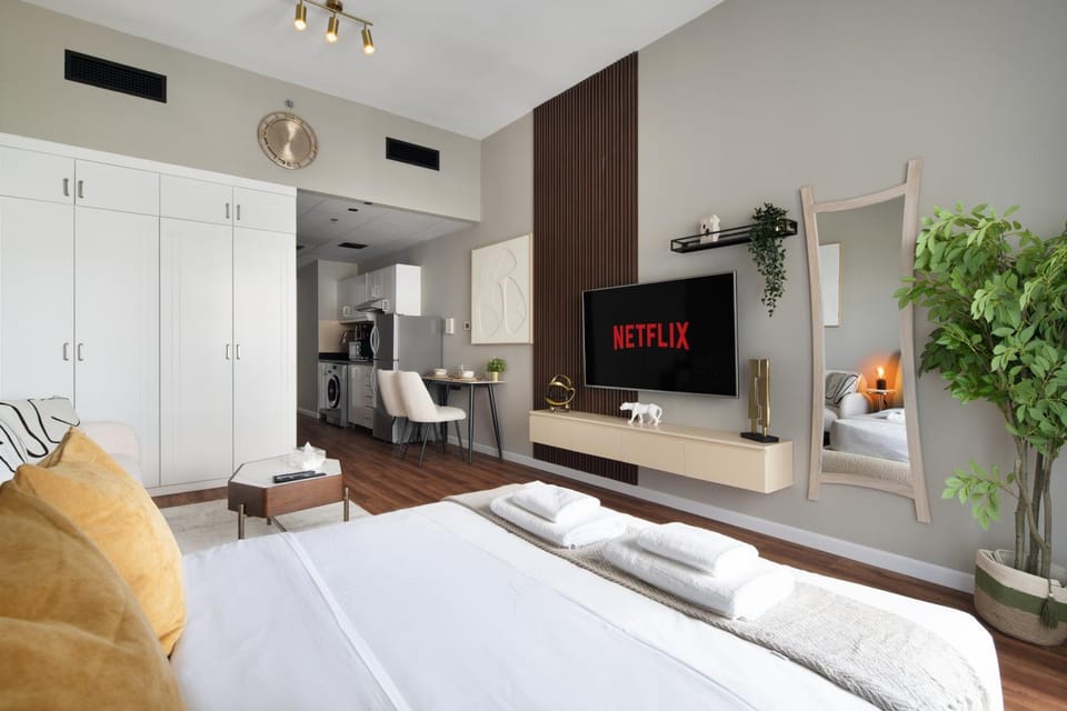 Bed, TV and multimedia, Living room, Seating area, wardrobe