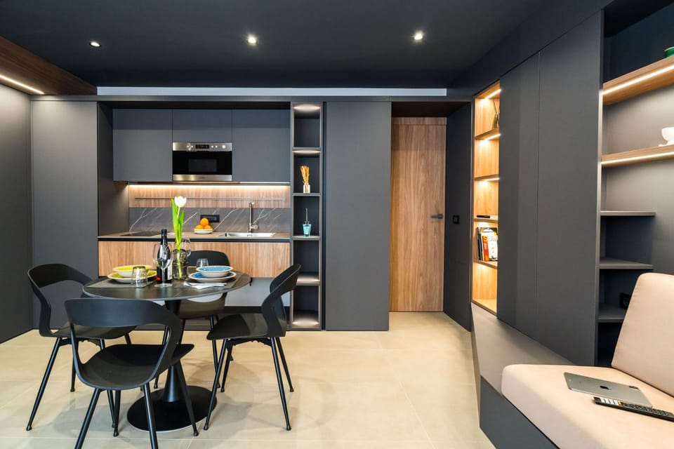Kitchen or kitchenette, Living room, Seating area, Dining area
