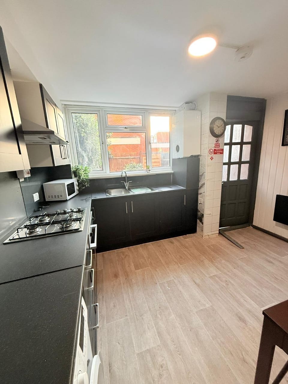 Kitchen or kitchenette, oven, stove