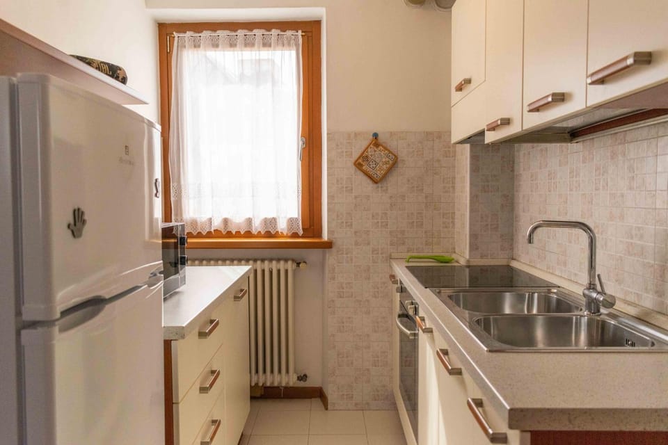 Kitchen or kitchenette, oven, stove