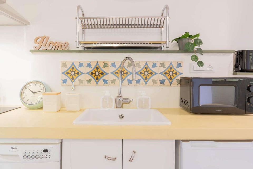 Kitchen or kitchenette, oven, toaster