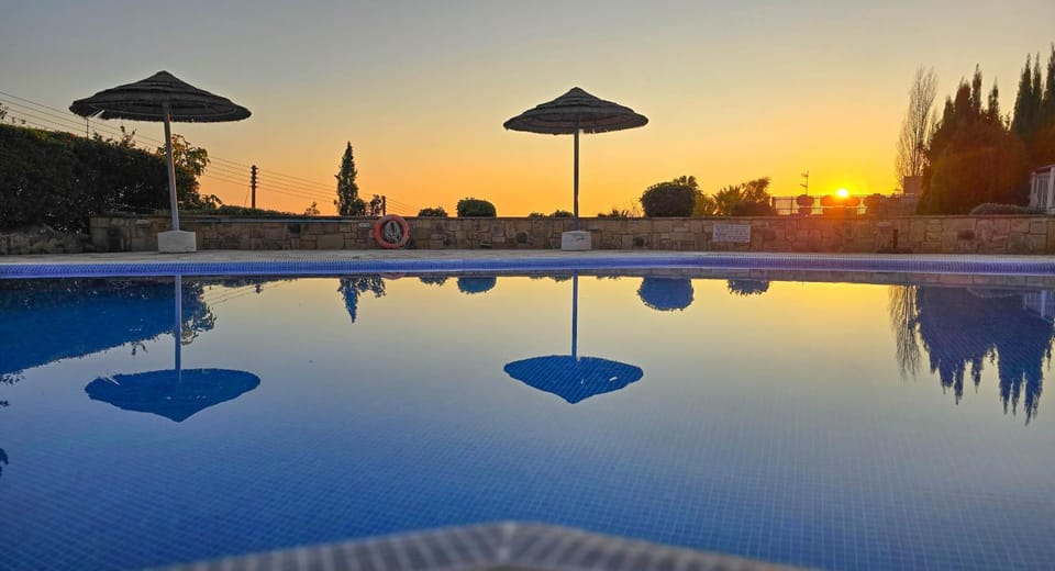 Day, Natural landscape, Pool view, Swimming pool, Sunset, sunbed