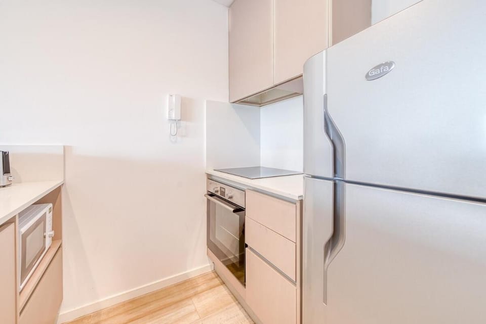 Kitchen or kitchenette, oven, stove