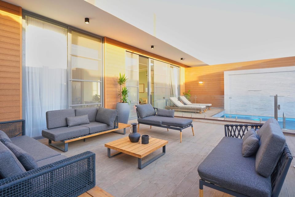 Patio, Day, Natural landscape, Pool view, Swimming pool, sunbed