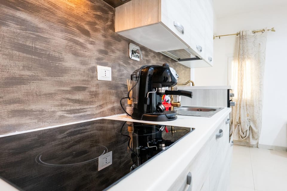 Kitchen or kitchenette, stove