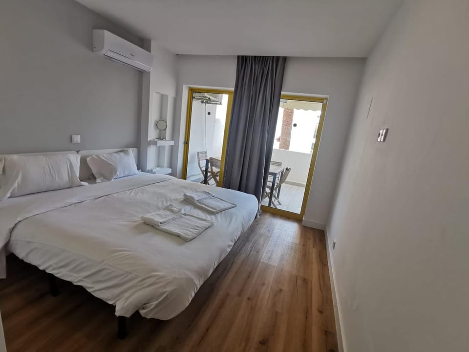 Bed, Photo of the whole room, Bedroom, towels, air conditioner