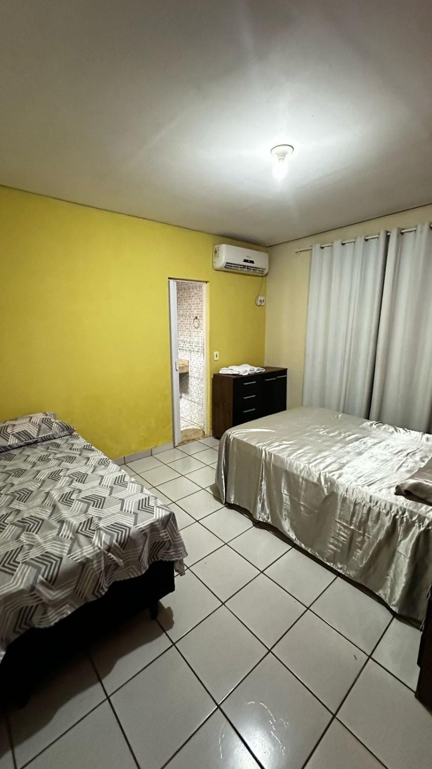 Suíte privativa com cozinha completa, ar e Wi-Fi House in Palmas