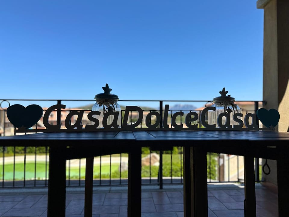 Day, Property logo or sign, View (from property/room), Balcony/Terrace, Logo/Certificate/Sign, Text overlay, Certificate/Award