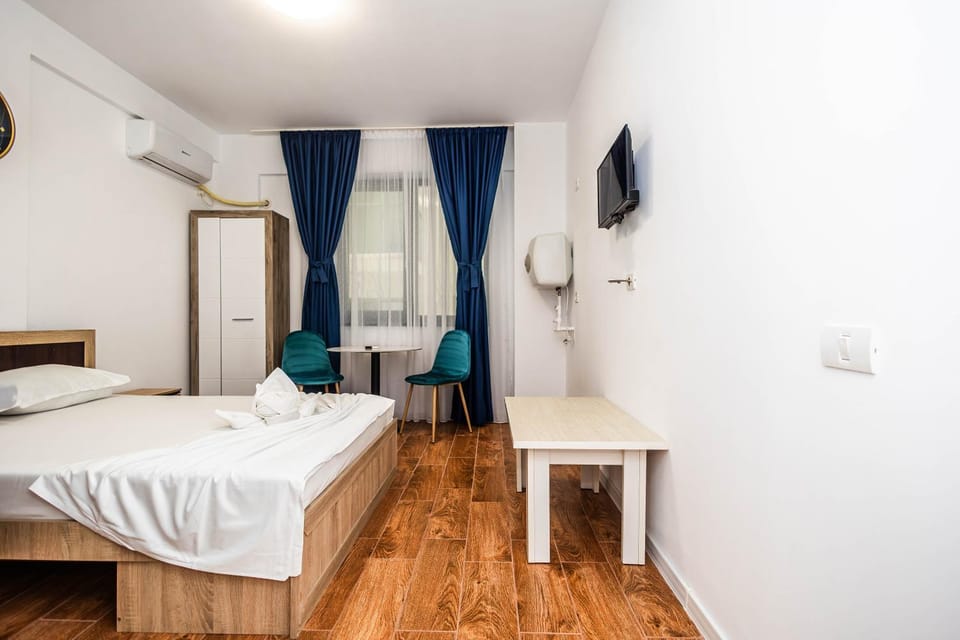 Bed, TV and multimedia, wardrobe, air conditioner