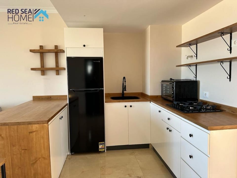 Kitchen or kitchenette, oven, stove