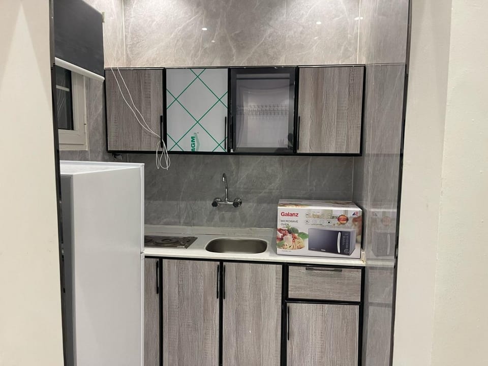 Kitchen or kitchenette, oven, stove