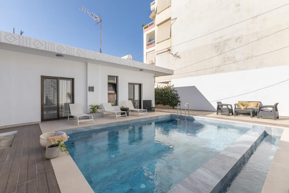 Property building, Living room, Swimming pool