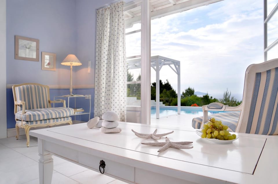 Living room, Seating area, Mountain view, Pool view, Sea view