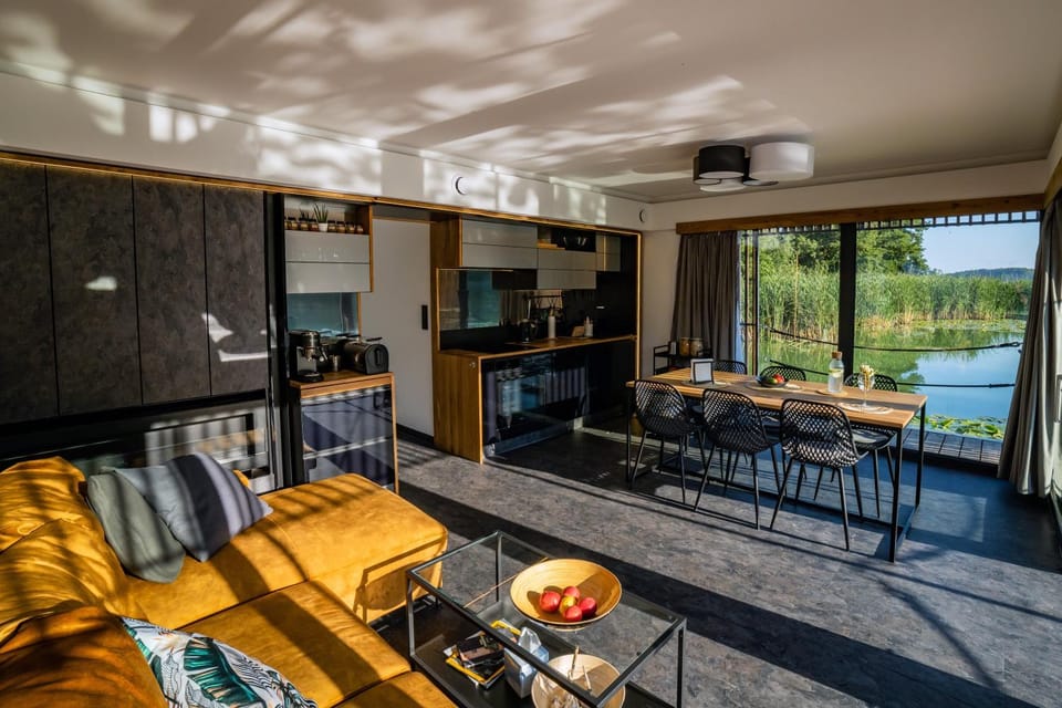 Natural landscape, Kitchen or kitchenette, Living room, Seating area, Dining area, Food, Lake view