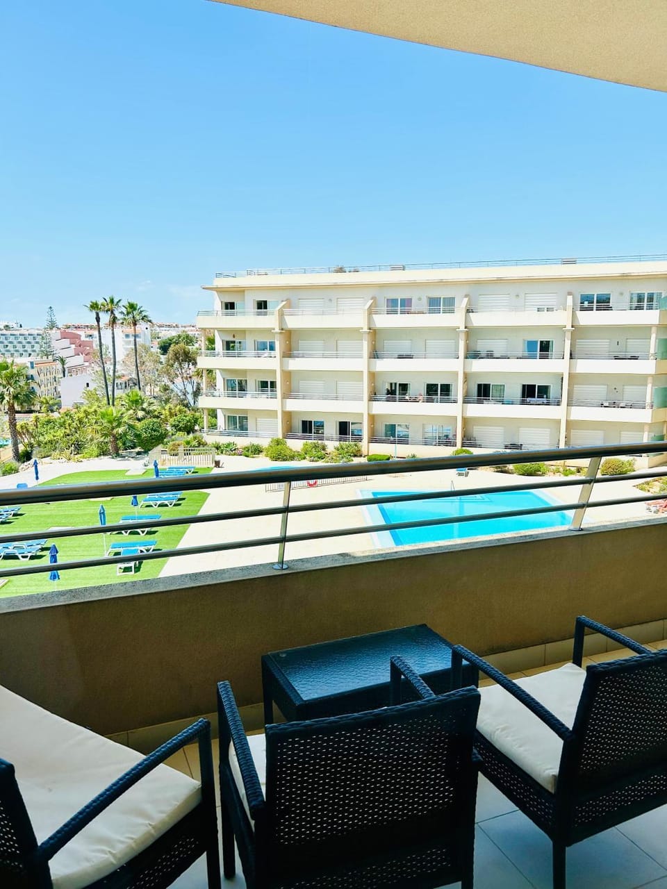 Property building, Patio, Day, View (from property/room), Balcony/Terrace, Pool view, Swimming pool, sunbed