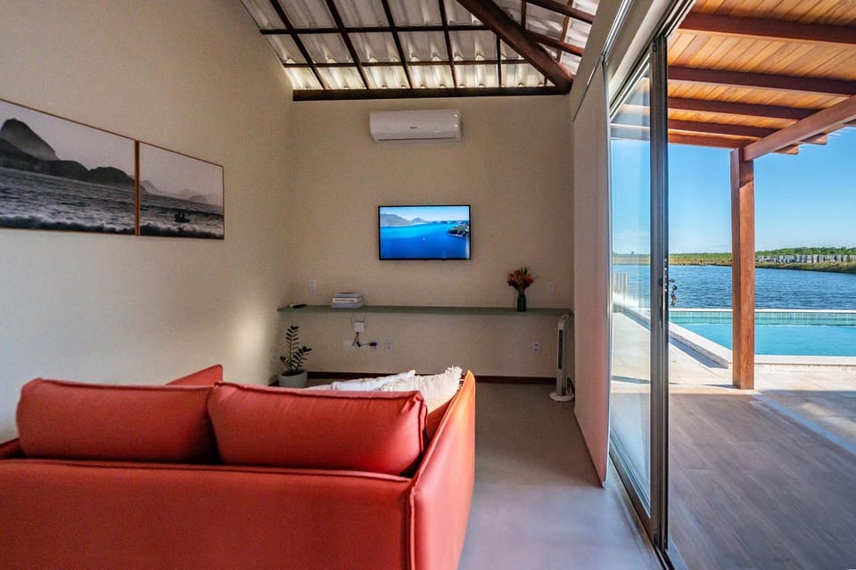 Communal lounge/ TV room, Natural landscape, TV and multimedia, View (from property/room), Living room, Seating area, Lake view