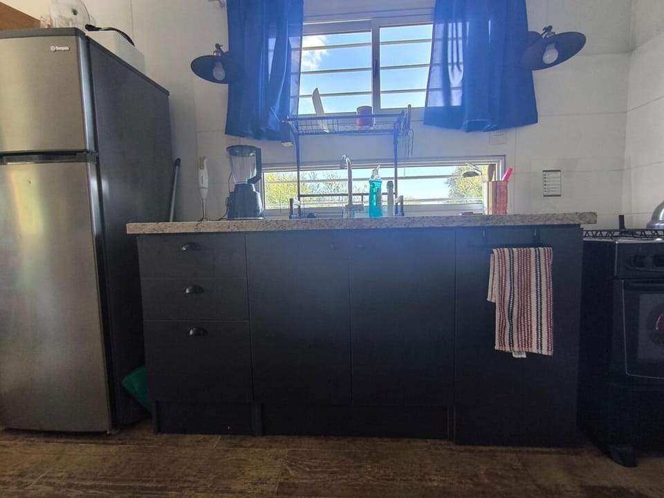 Kitchen or kitchenette, oven, stove