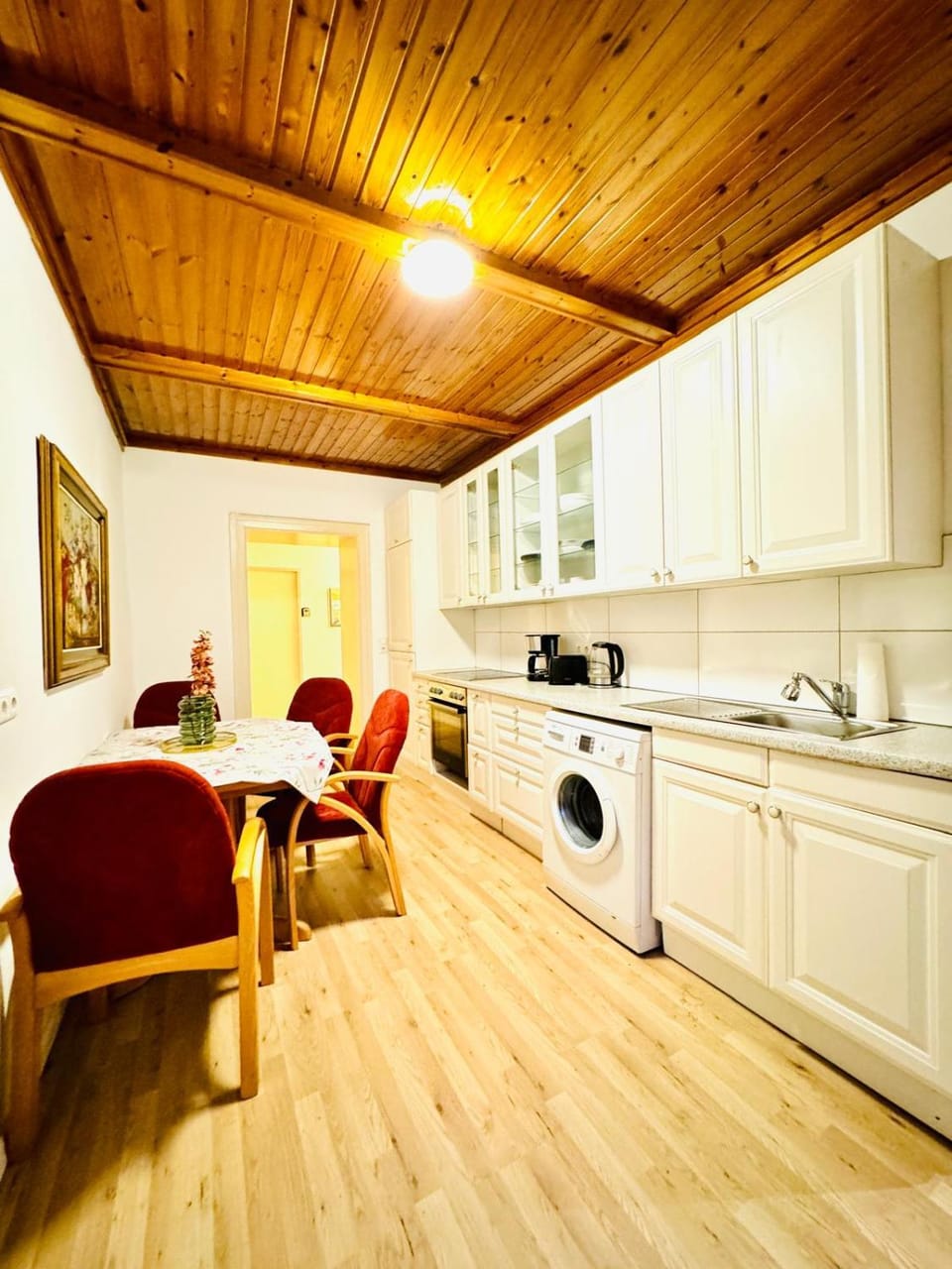 Kitchen or kitchenette, Dining area, washing machine