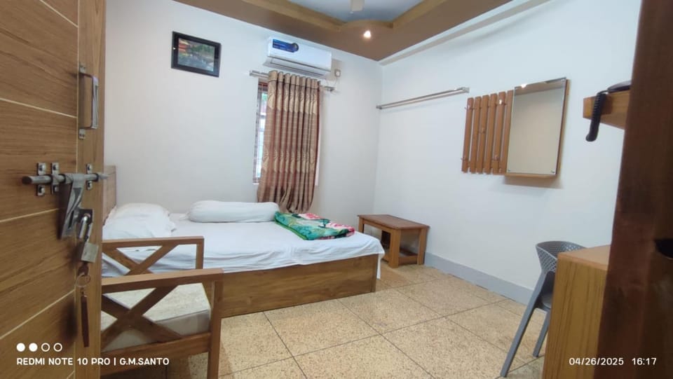 Bed, Photo of the whole room, Bedroom, towels, air conditioner