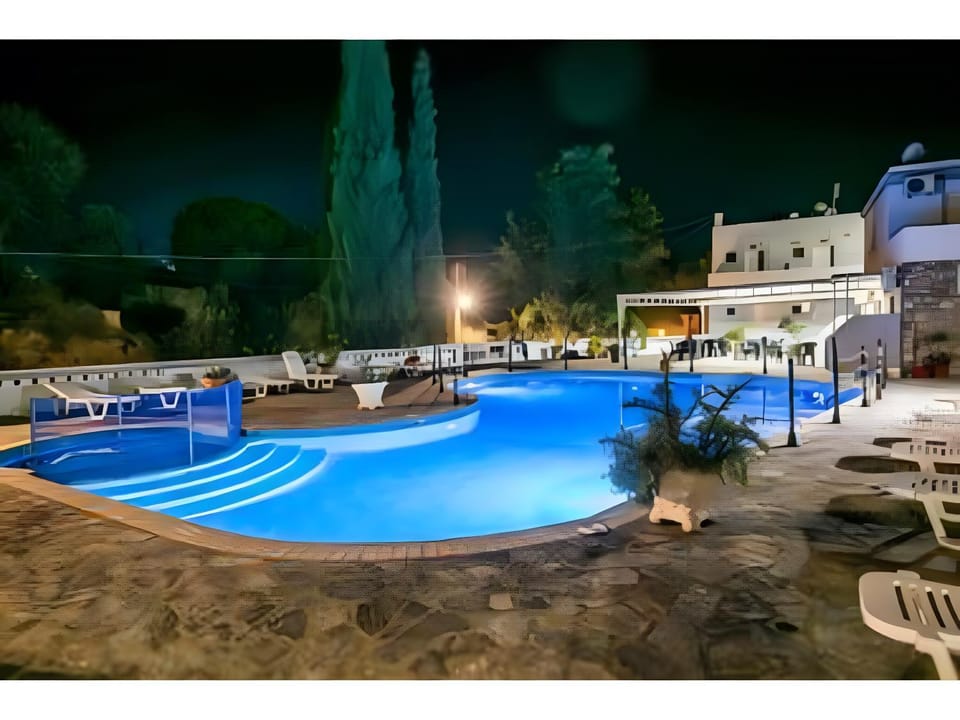 Property building, Living room, Swimming pool